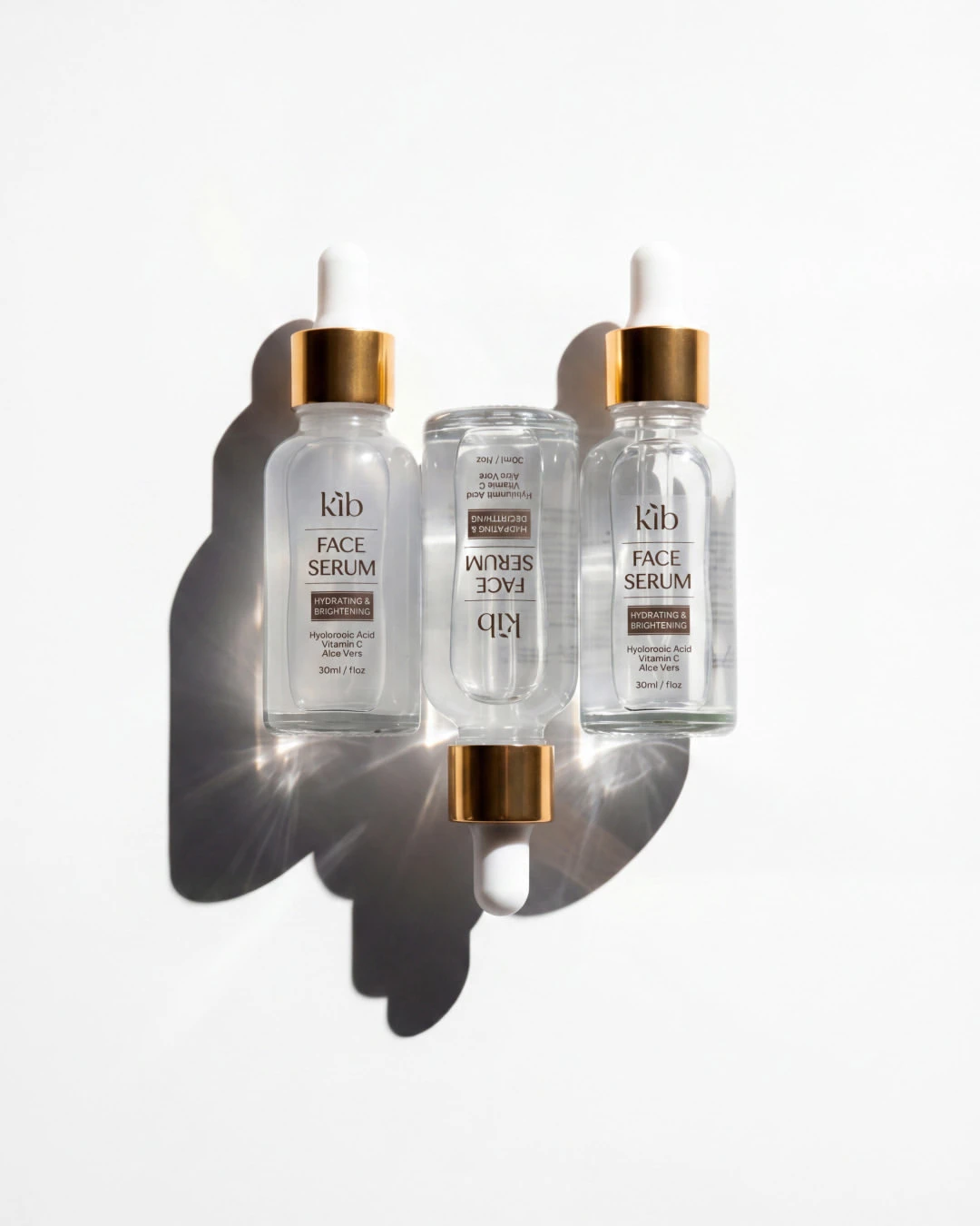 Tre kuti KIB Face Serum me shkronja ari
